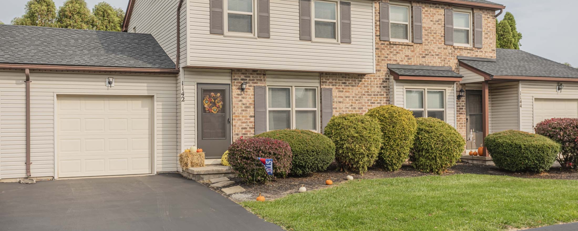 New England Village Alloco Real Estate