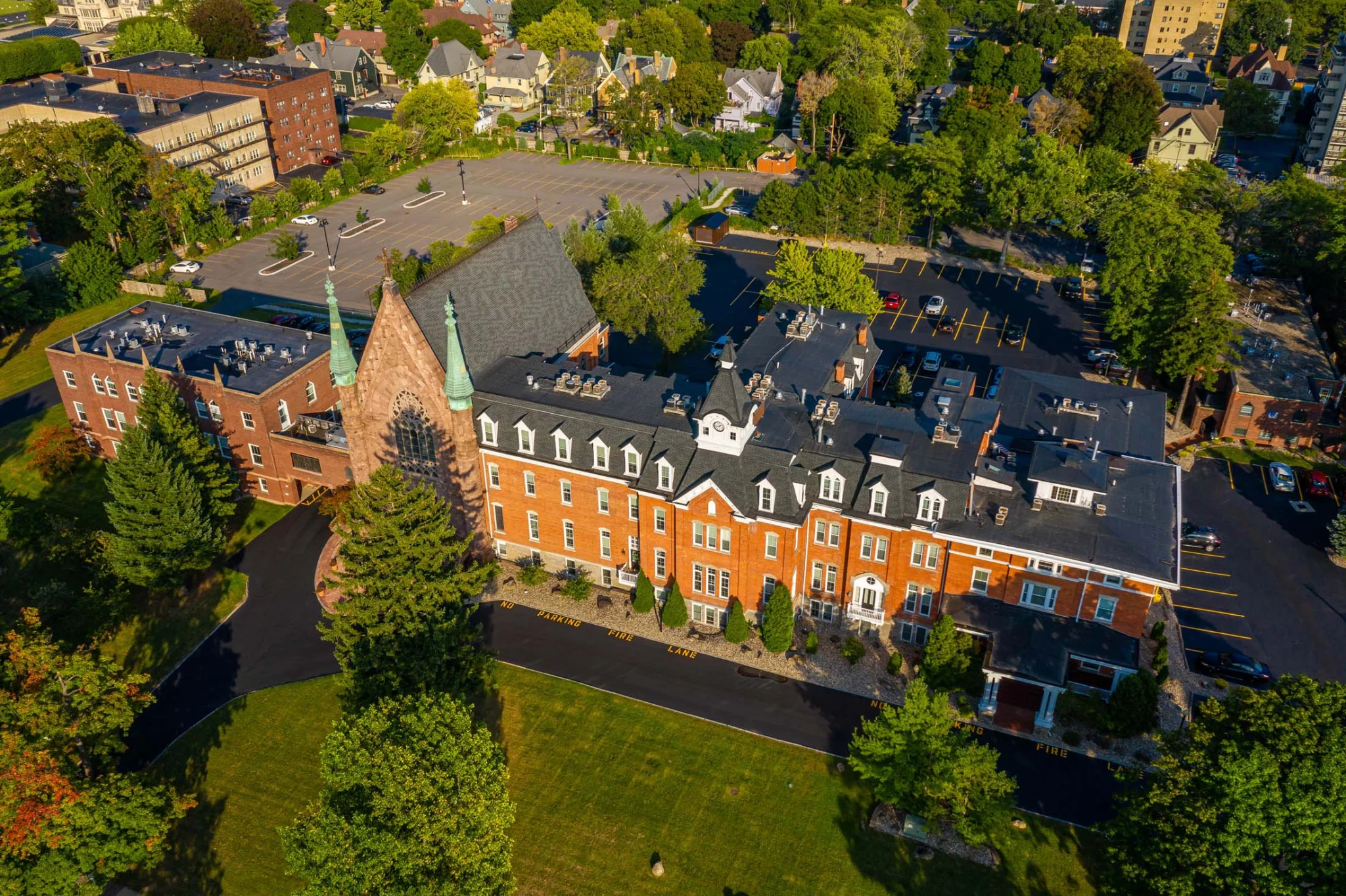 Aerial view of historic red-brick college building
